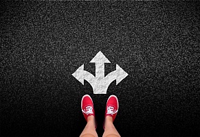 at-a-crossroads--decisions-and-choices-concept